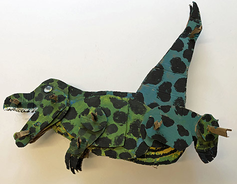 Brent Brown | BRB452 | Tyrannosaurus, 2018 | 
	 Cardboard, Mixed Media, on Canvas | 23 x 18 x 7in. at the Outsider Folk Art Gallery