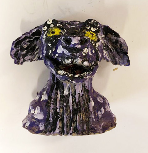 Brent Brown | BRB566 | Purple Dog, 2018 | 
	 Cardboard, Mixed Media | 7 x 6 x 3 in.  at the Outsider Folk Art Gallery