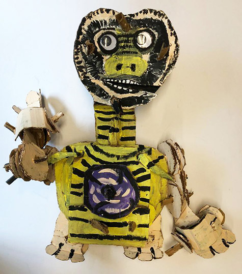 Brent Brown | BRB574 | ET, 2019   | 
	 Cardboard, Mixed Media, on Canvas | 26 x 24 x 7 in. at the Outsider Folk Art Gallery