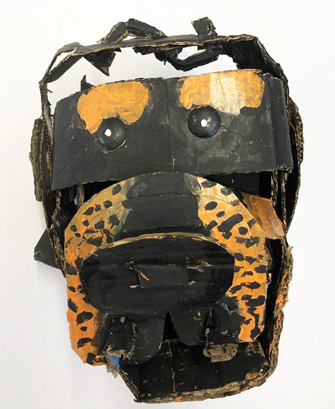 Brent Brown | BRB695 | Ron the Rottweiler, 2019 | 
	 Cardboard, Mixed Media | 9 x 10 x 12 in. at the Outsider Folk Art Gallery
