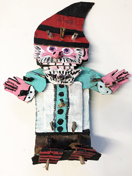 Brent Brown | BRB840 | Ho Ho Elf, 2020 | 
	 Cardboard, Mixed Media | 20 x 25 x 6 in. at the Outsider Folk Art Gallery
