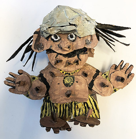 Brent Brown | BRB961 | Hawaiian Menenume, 2021  | 
	 Cardboard, Mixed Media | 15 x 14 x 9 in. at the Outsider Folk Art Gallery