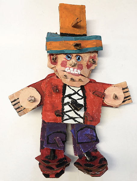 Brent Brown | BRB979 | Head Elf, 2021 | 
	 Cardboard, Mixed Media | 28 x 20 x 7 in. at the Outsider Folk Art Gallery
