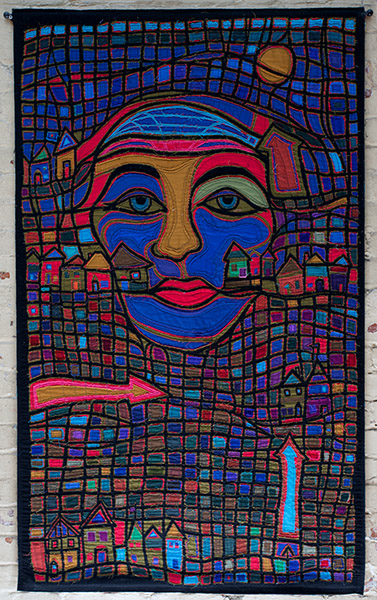 Mary Stoudt | STM006 | Village Dreamscape, 2010 | Fabric-art quilt | 33 x 55 in. (83.8 x 139.7 cm) at the Outsider Folk Art Gallery